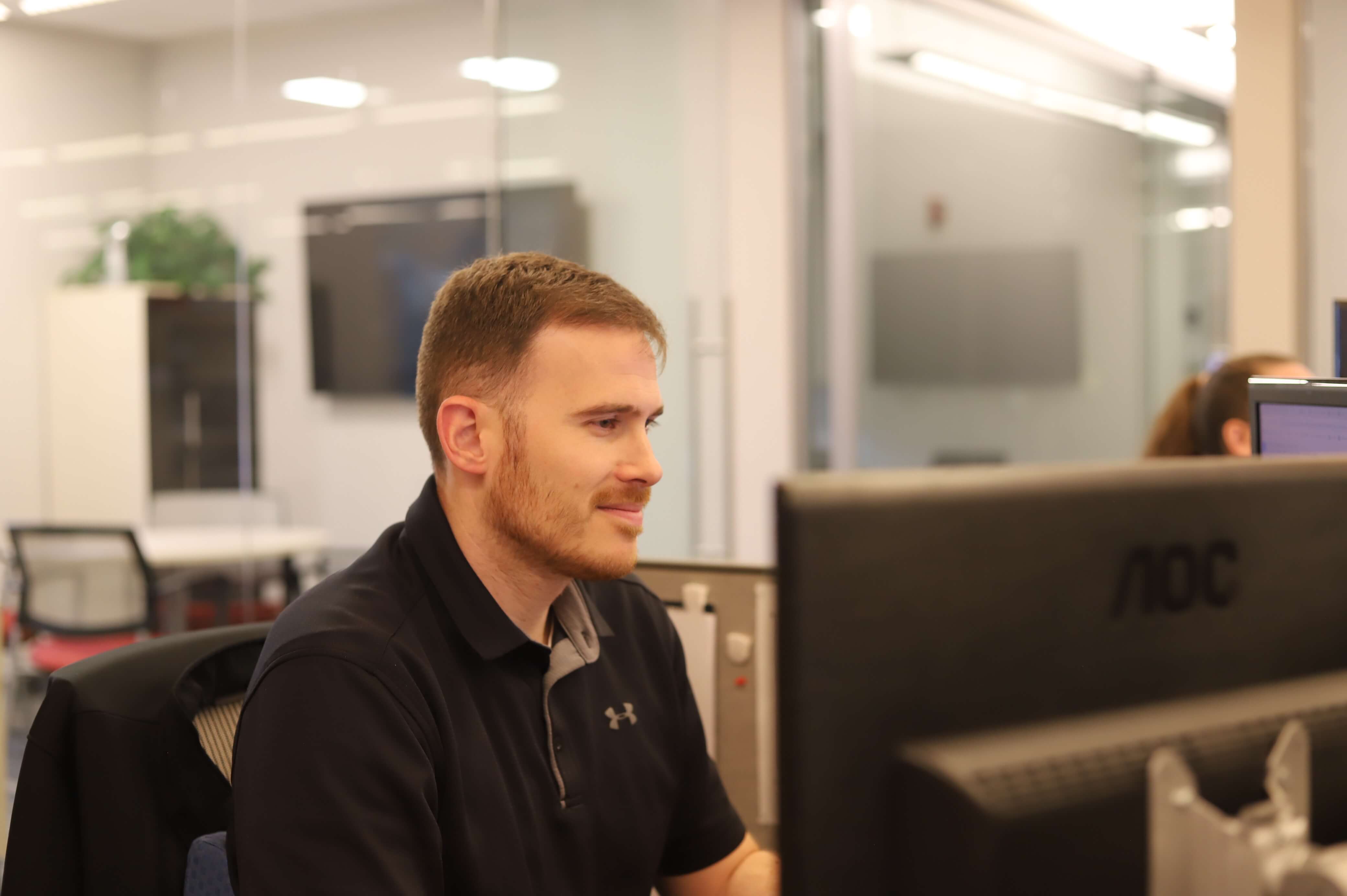 Jarrett employee working on a computer in the office