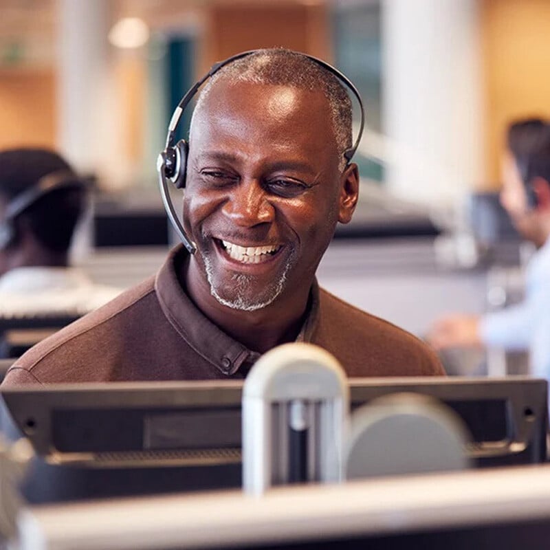 Jarrett employee directing logistics instructions on a phone headset