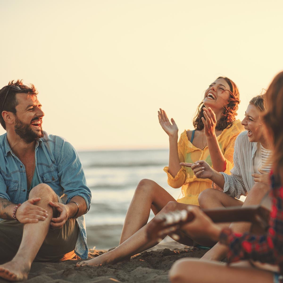 Friends enjoying paid time off at the beach