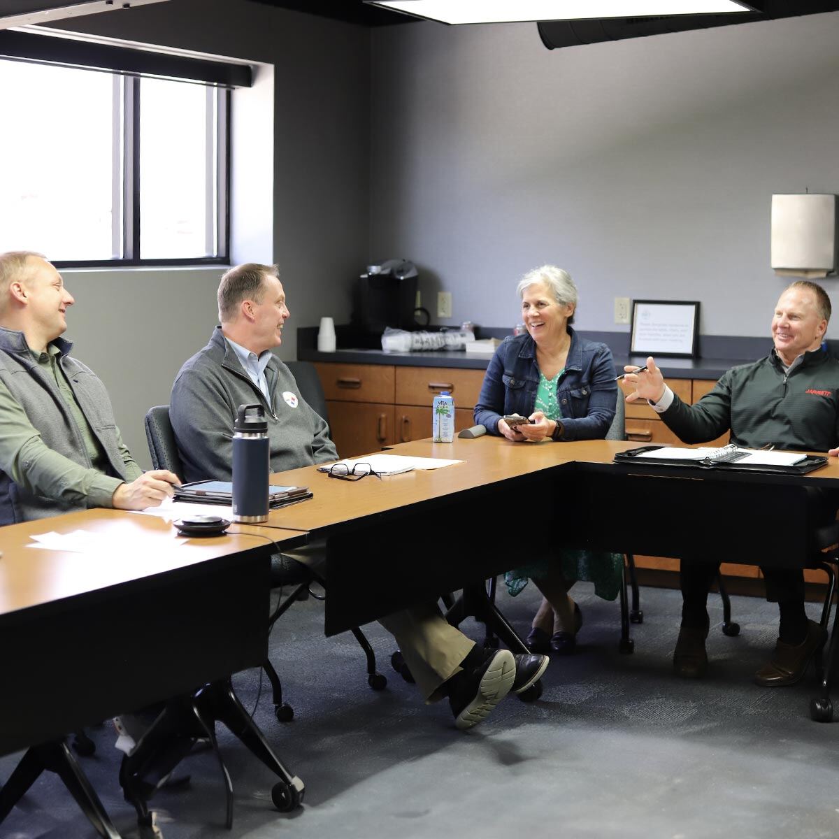 Jarrett team collaborating in the conference room