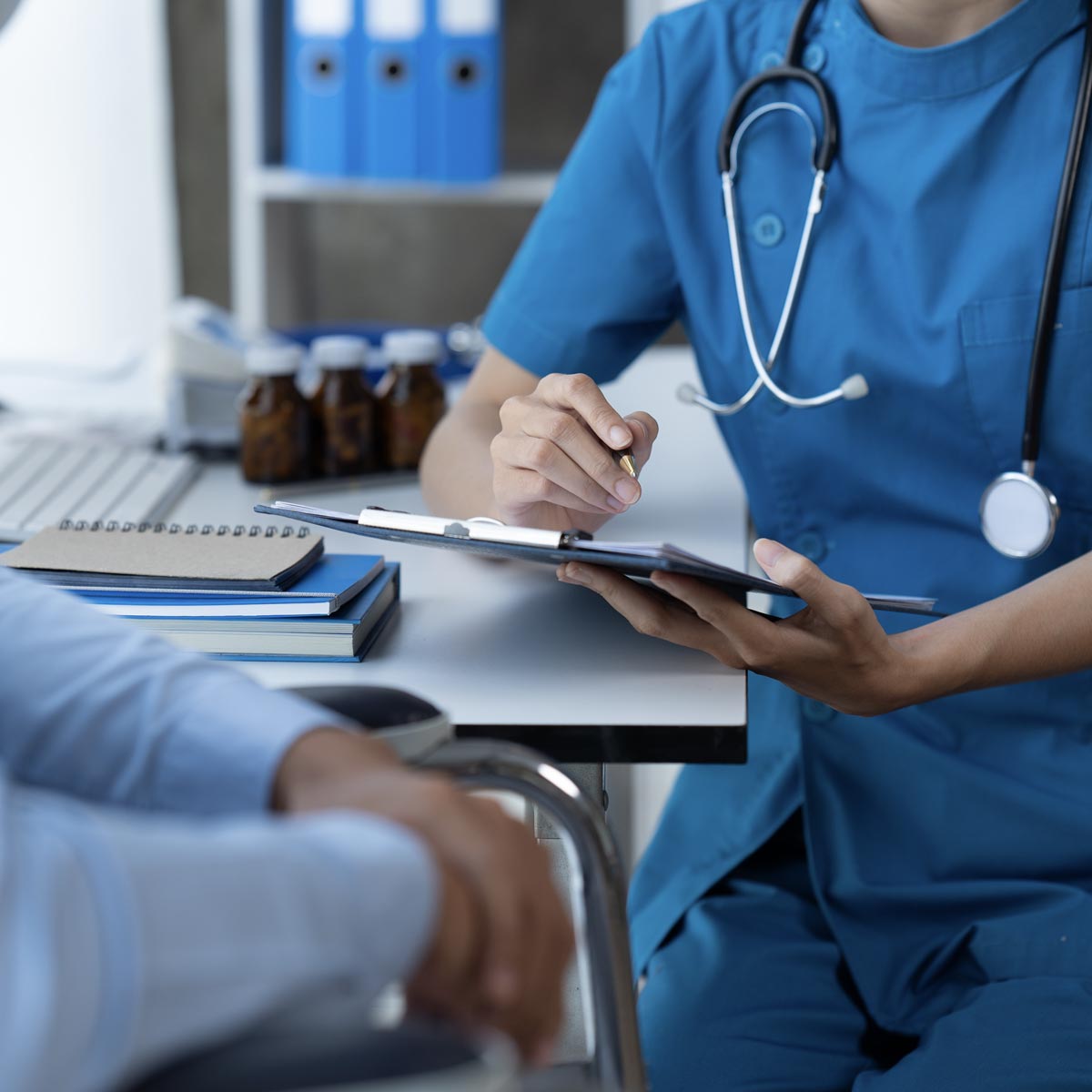 Nurse asking patient questions in a medical office