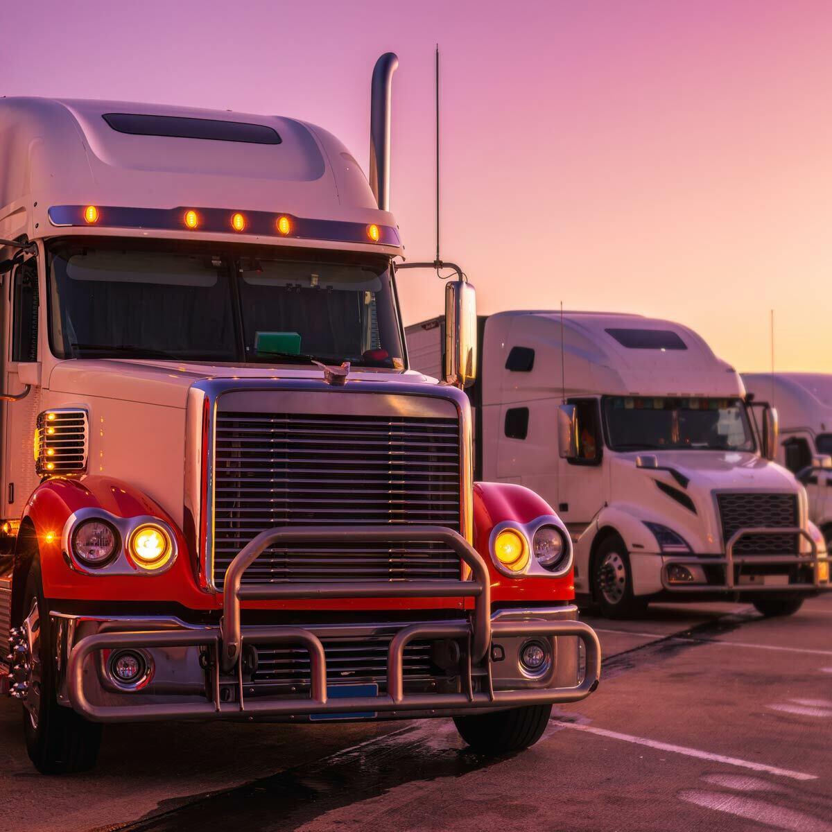 Fleet trucks driving on a highway